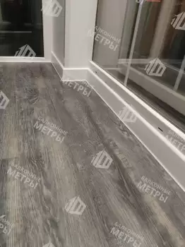 Панорамное остекление и отделка п-образного балкона с утеплением